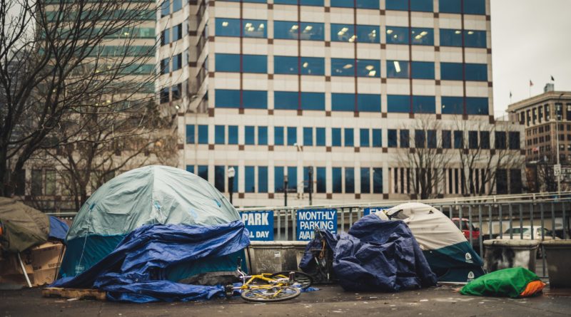 Photo by Brett Sayles: https://www.pexels.com/photo/tents-and-bicycle-on-city-street-6927507/
